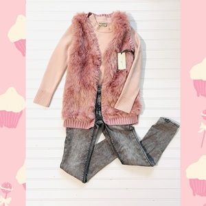 Girl’s blush/mauve furry vest